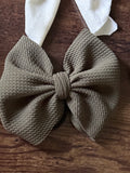 Large green hair tie bow
