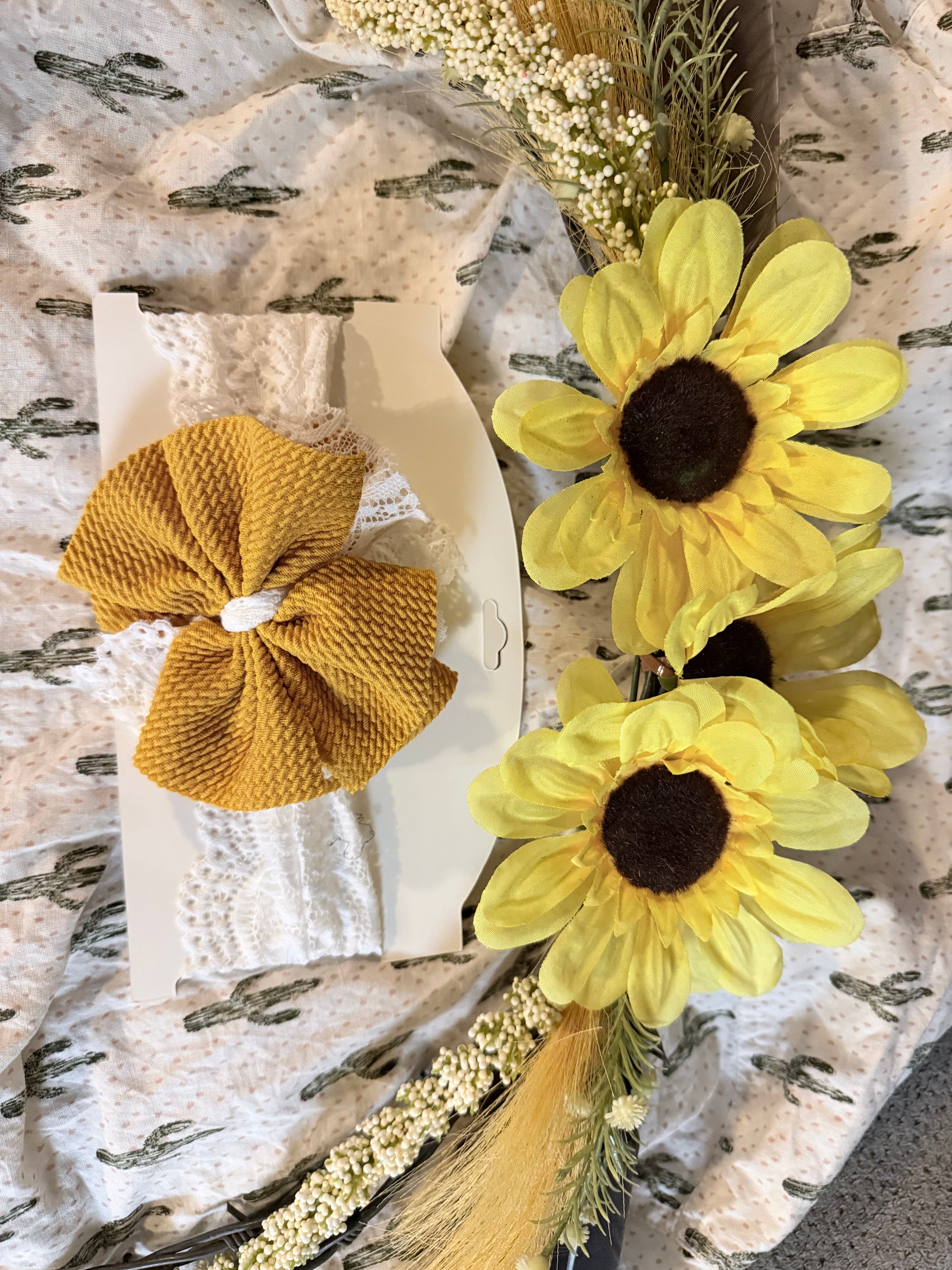 White lace wrap with mustard yellow bow