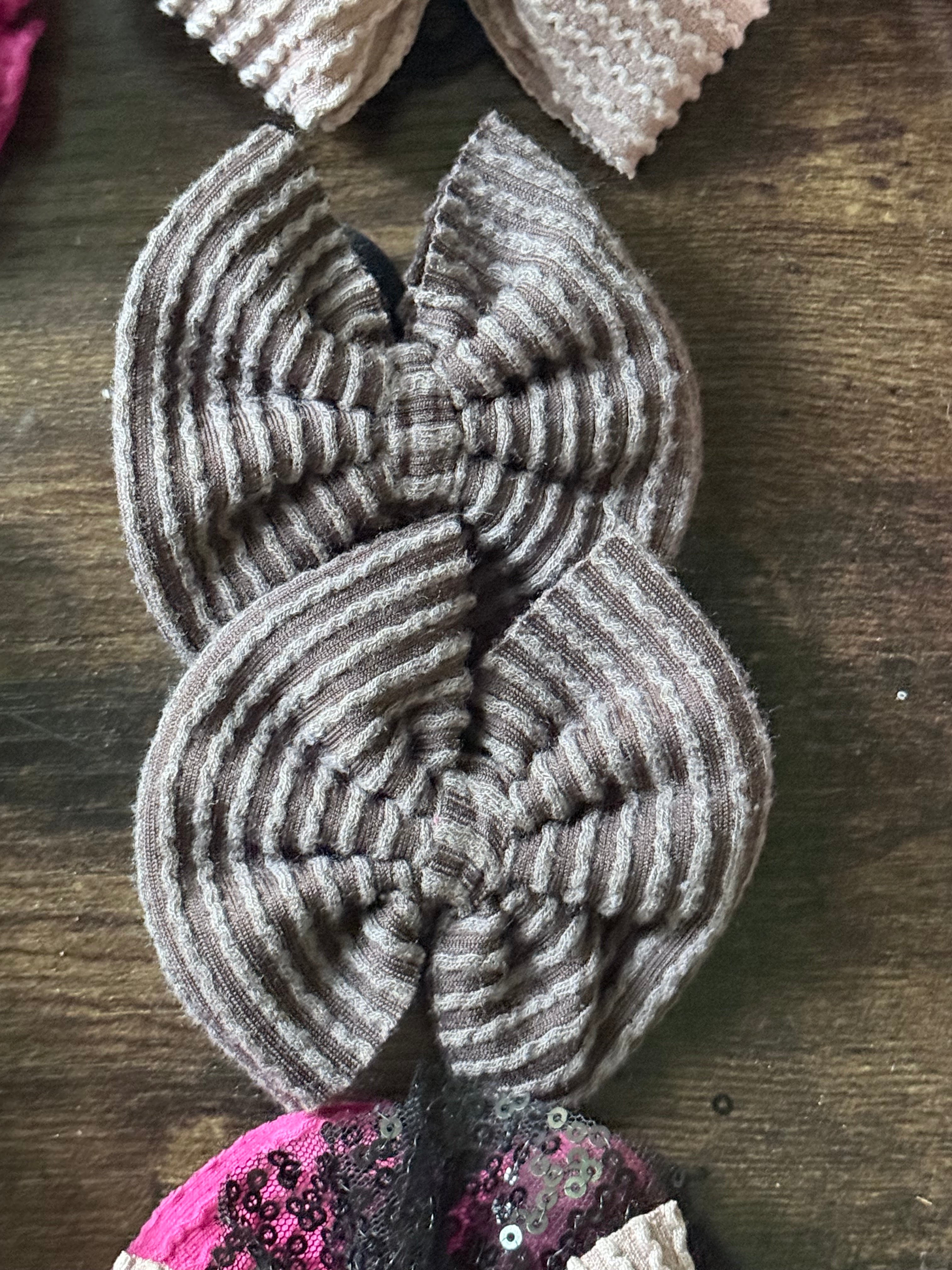 Small brown hair tie piggies