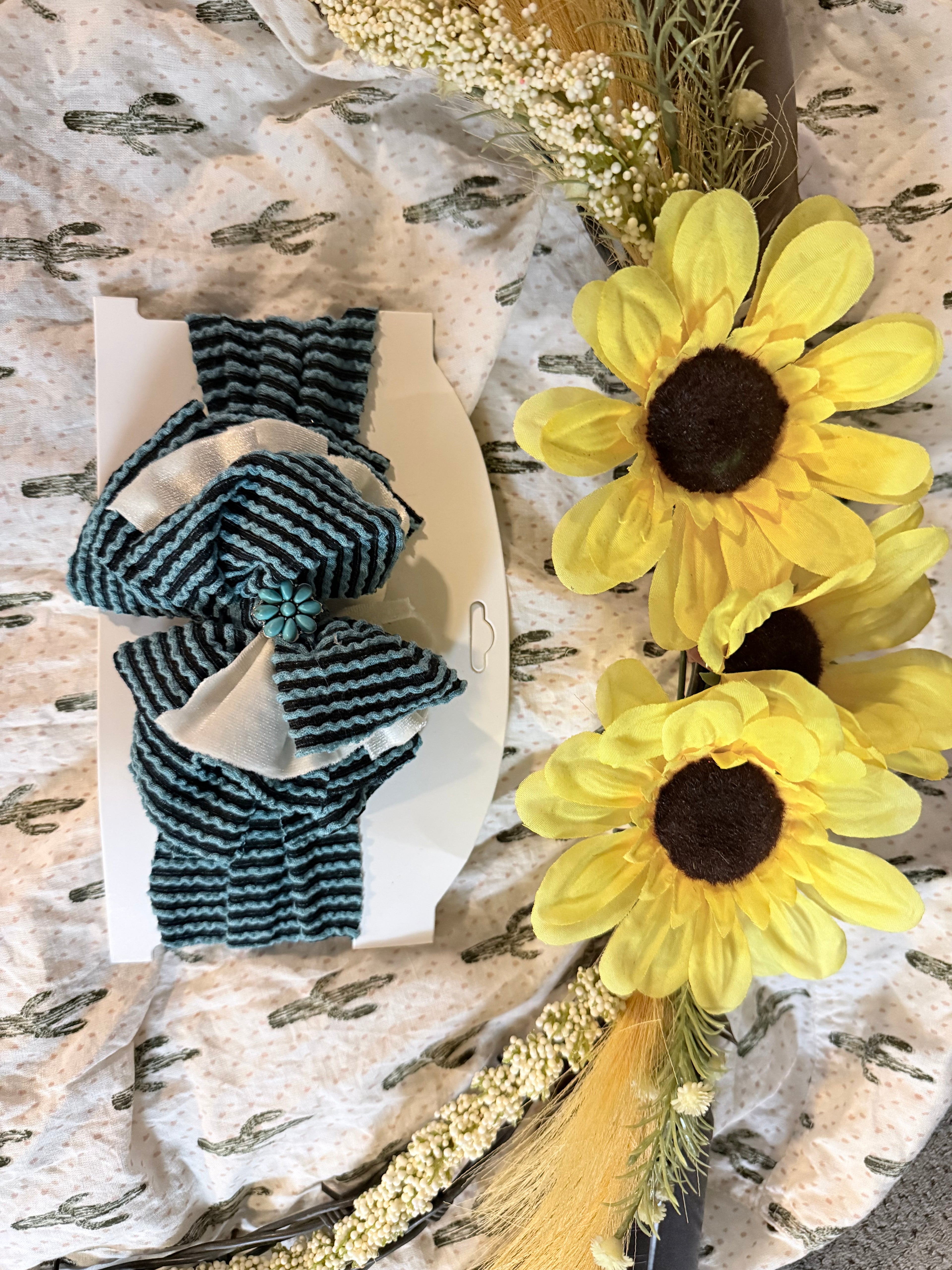 Blue and white headwrap with center flower