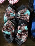 Small pig tail bows cheetah print
