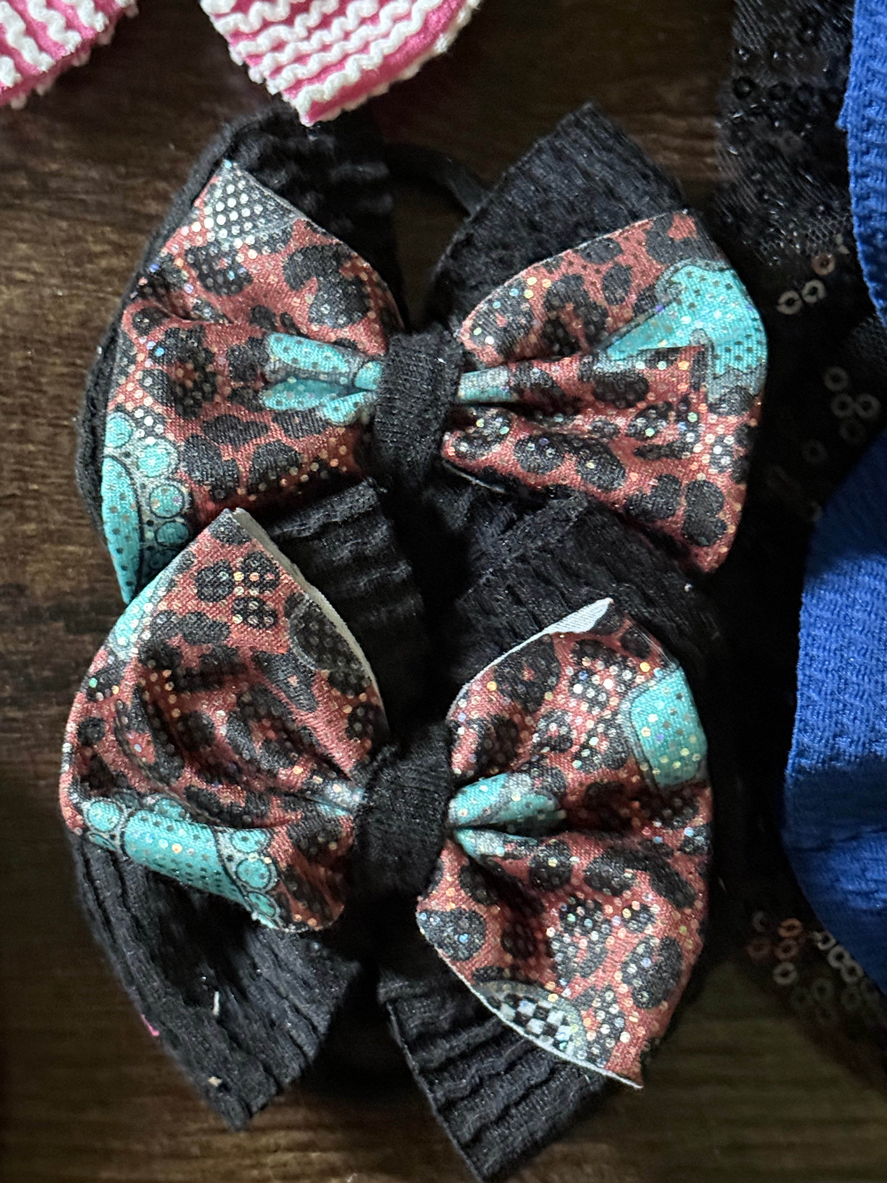 Small pig tail bows cheetah print