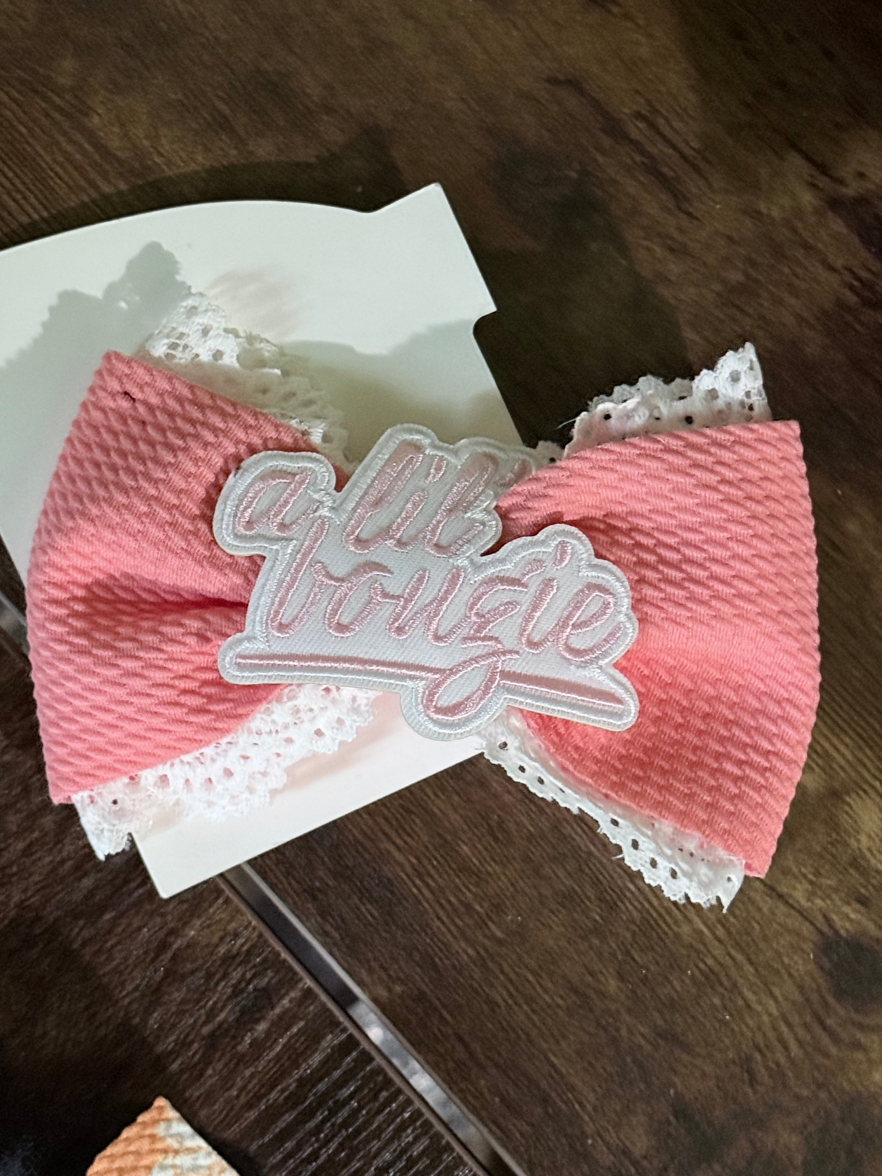 Large pink bow clip with patch